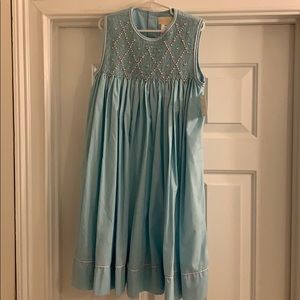 Brand new girls blue dress with smocking